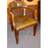 Green leather upholstered Captain's chair