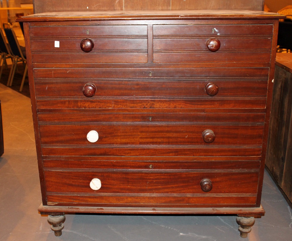 Victorian two short over three long chest of drawers, 106 x 50 x 108 cm with turned wooden legs.