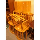 Rectangular pine kitchen table with four matching dining chairs