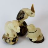 Netsuke - three figures, one elephant, one seal,