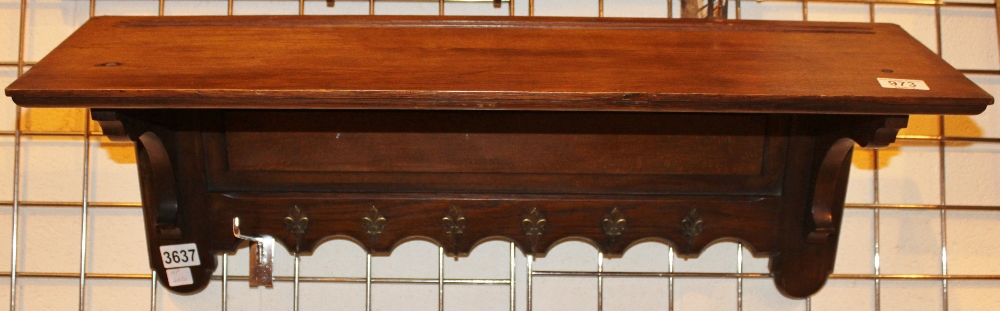 Hand made oak carved shelf and coat rails
