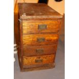 Narrow oak chest of four drawers,