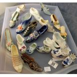 Tray of shoe related ceramic ornaments