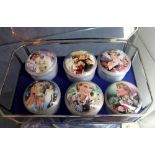 Set of six Princess Diana musical trinket boxes by the Franklin mint in a glass jewellery box