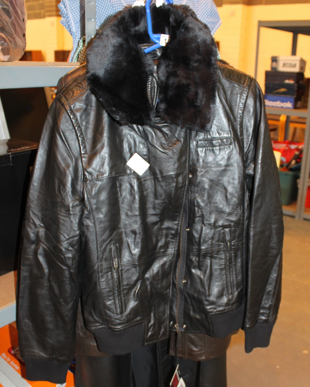 Two Eastpak apparel black leather jackets