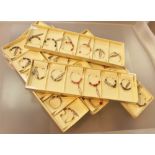 Quantity of white metal ladies earrings