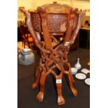 Large decorative carved wooden bowl with lid on a complex carved one piece 6 legged base