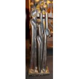 Cast metal modern stylised statue of figures signed Hamilton