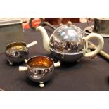 Three piece Art Deco tea service with insulated teapot