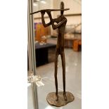 Bronze flute playing figurine in the style of Dooley,