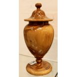Turned wooden urn in yew,