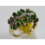 9 ct gold emerald and diamond fancy ring,