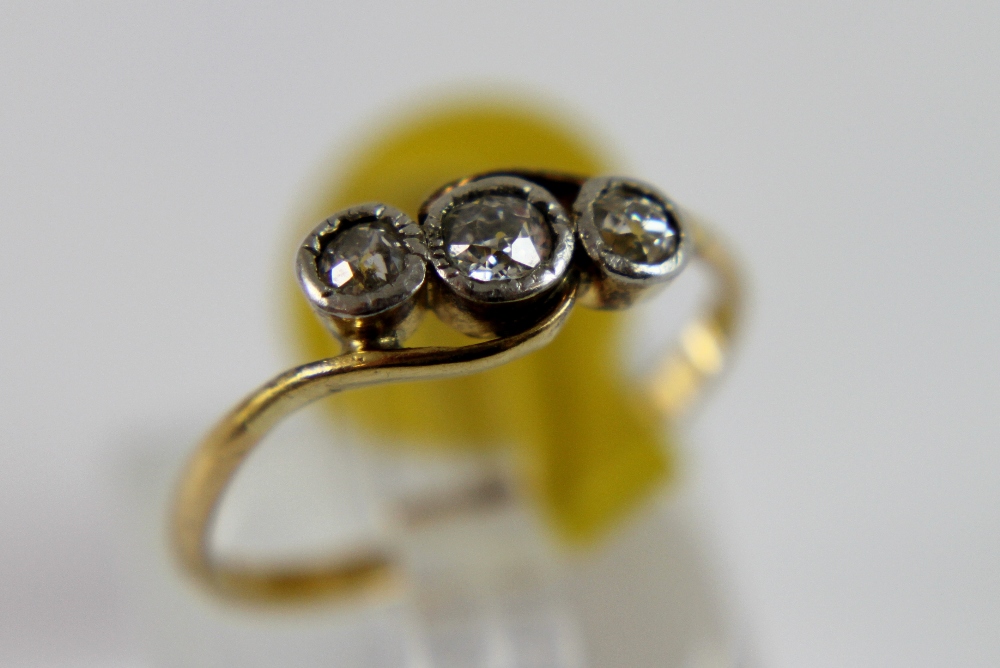 18 ct yellow gold antique three stone set diamond ring, size N.