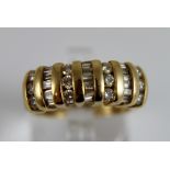 14 ct yellow gold circular and baguette cut diamonds ring. Approx 1 ct diamonds. Size N.