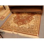 Large fringed woollen brown and cream decorative rug