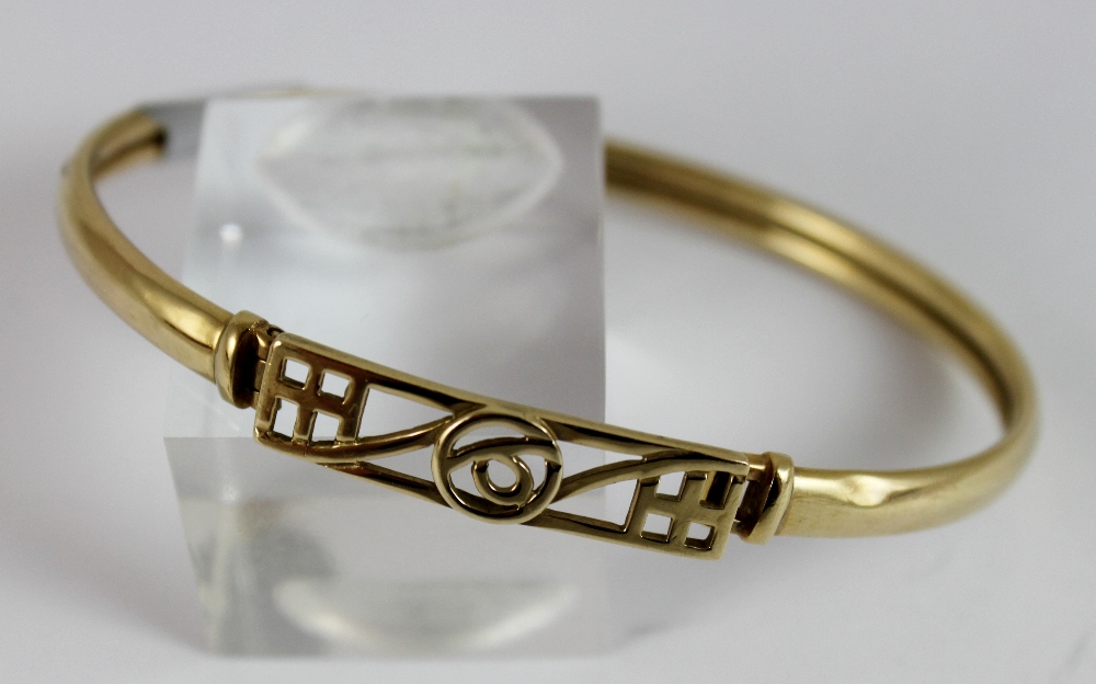 9 ct gold fancy Celtic bangle.