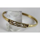 9 ct gold fancy Celtic bangle.