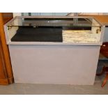 Shop display unit with interior lighting and under drawers