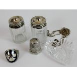 Selection of silver items including silver topped salt and pepper, thimble,