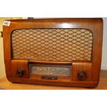 Vintage Sobell valve radio in a wood cabinet with bakelite controls
