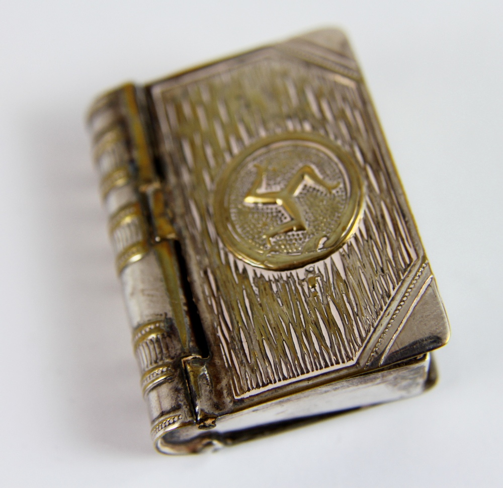 Silver plated vesta case with stamp case in the form of a book with three legs of man impressed to