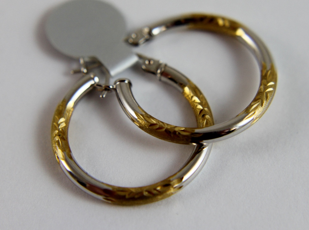 9 ct gold fancy loop earrings. 1.