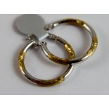 9 ct gold fancy loop earrings. 1.