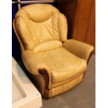 Cream leather reclining armchair