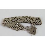 Silver gate bracelet with padlock clasp
