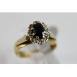 18 ct yellow gold sapphire and diamond cluster ring,