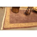 Large woolen lilac coloured rug with fringe,