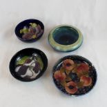 Four Moorcroft dishes including open pomegranate design