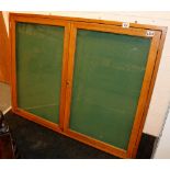 Wood framed display case with locking glass doors (key in office)