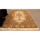 Large woollen fringed decorative brown and cream rug,