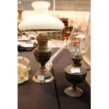 Pair of vintage oil lamps, Brass and white metal bases,