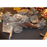 Pair of hand carved wooden supports with scrolls, swags,