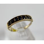 9 ct yellow gold, seven stone sapphire ring,