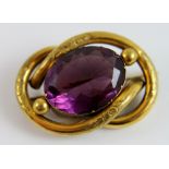 Victorian brooch set with a purple stone