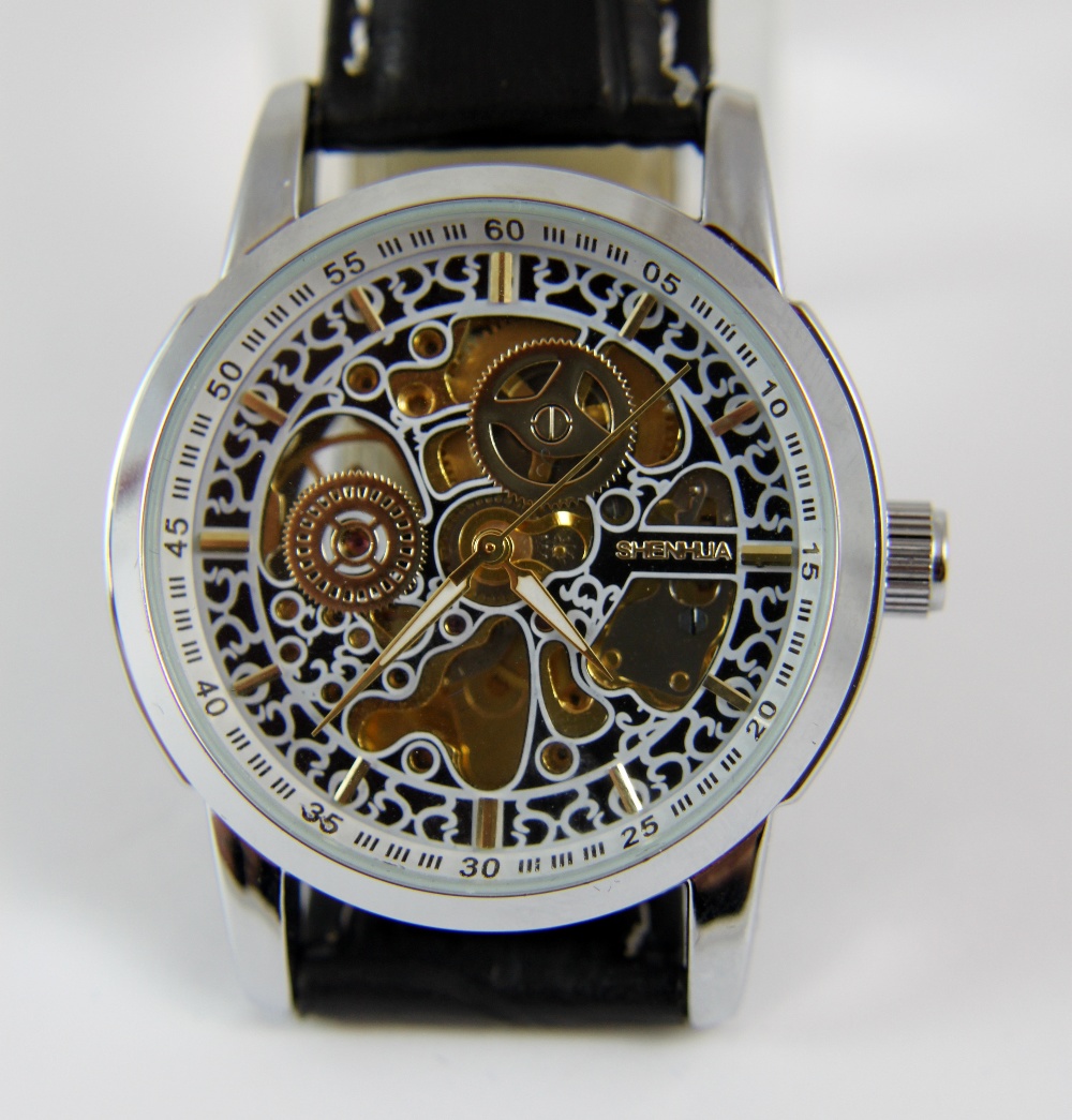 Automatic skeleton movement stainless steel gents wristwatch with leather strap