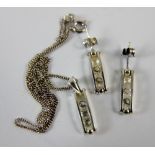 Matching diamante set earrings and pendant set on 925 silver