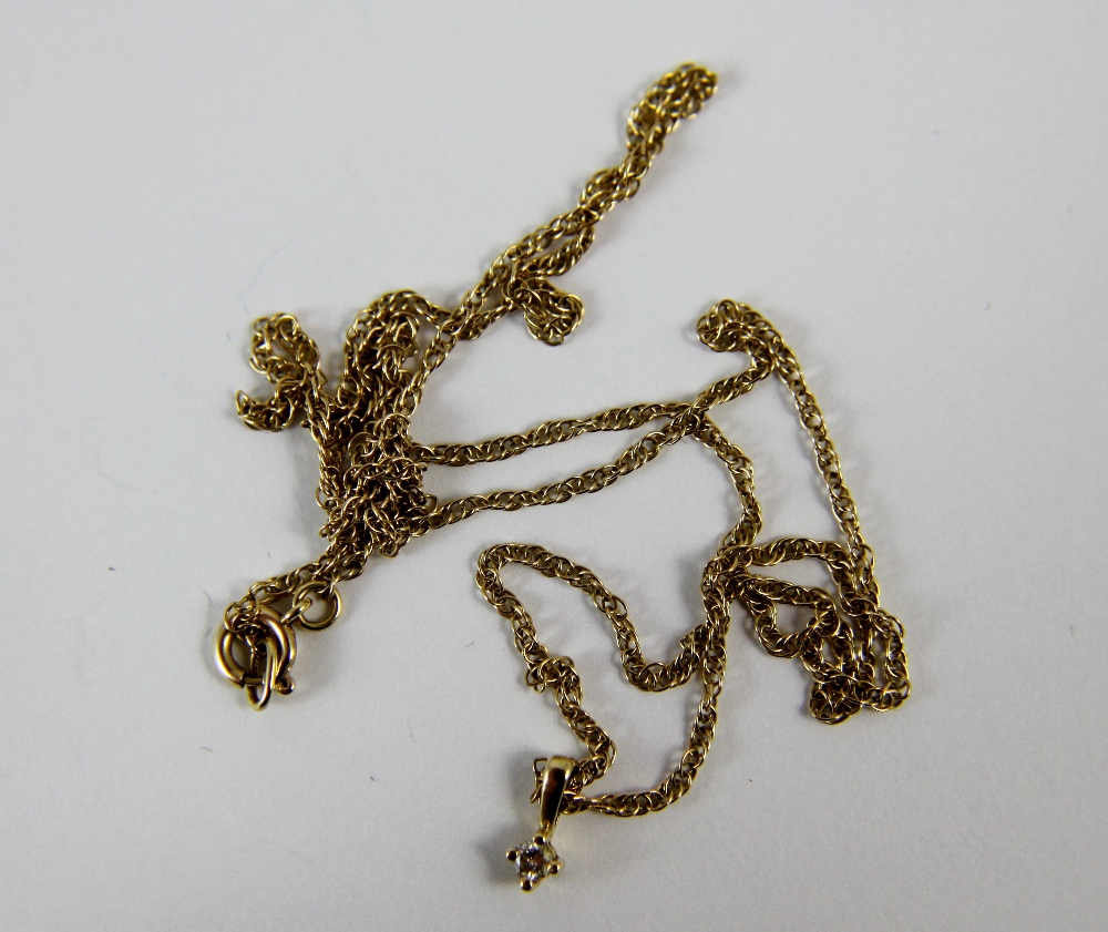 9 ct gold chain with diamond pendants, 1.