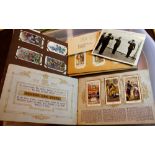 Two albums of cigarette cards; Hignetts, Players and Wills,