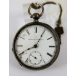 Silver cased key wind Elgin pocket watch with key, crystal absent.