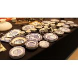 Large quantity of Willow pattern blue and white dinnerware