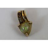 9 ct gold Australian jelly opal and diamond pendant