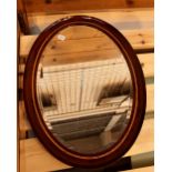 Mahogany inlaid bevelled edge oval mirror