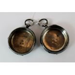 Two silver pocket watch cases