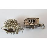 Two silver charms vintage caravan and hedgehog