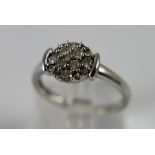 9 ct white gold and diamond fancy set ring,