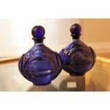 Two Bristol blue perfume bottles.